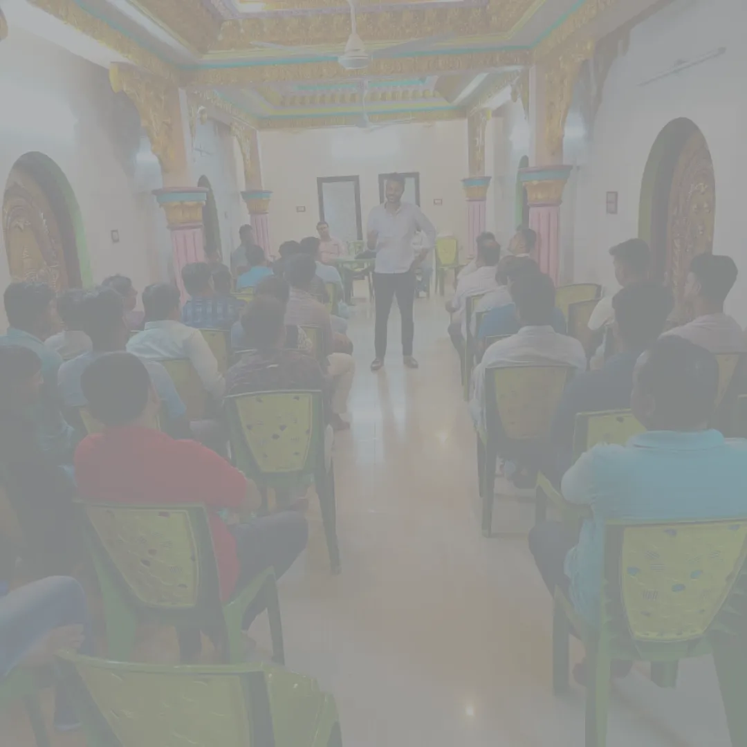 Artisans and community members meeting with the Jana Human Hair team