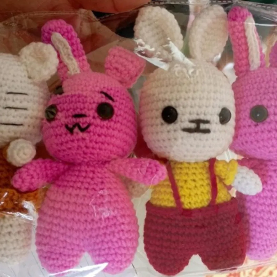 Crocheted bunny toys in pink and cream