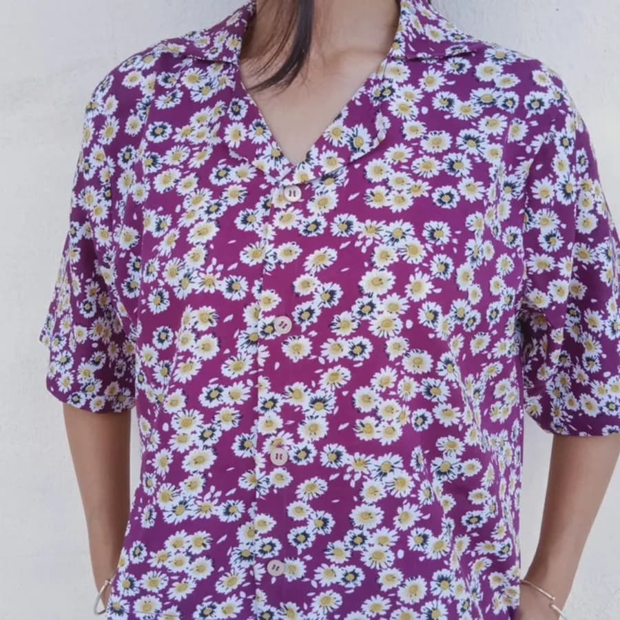 A hand-printed purple floral shirt