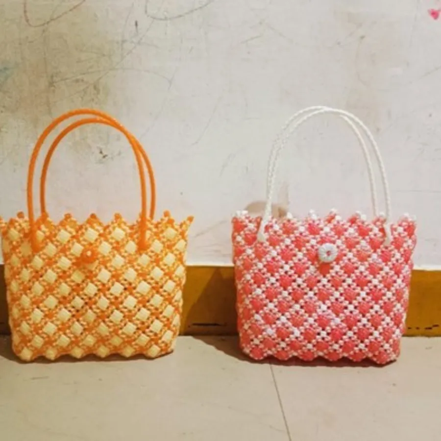 Two woven baskets in orange and red