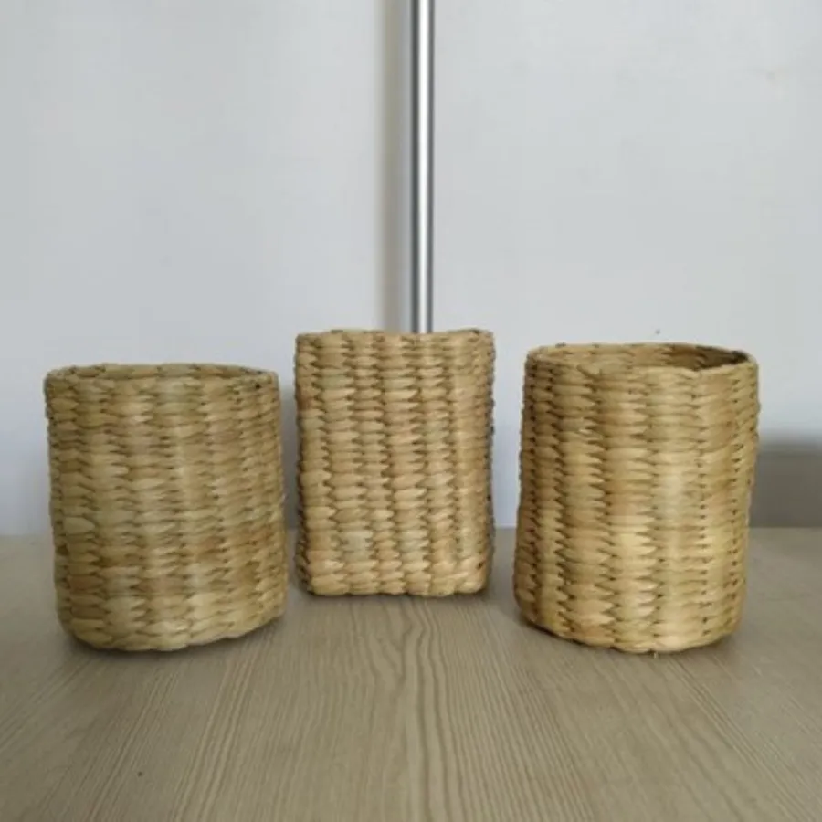 Three small woven baskets